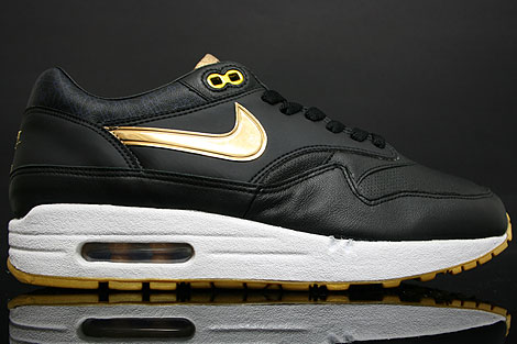 black and gold nike thea